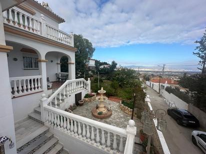 Exterior view of House or chalet for sale in Málaga Capital  with Air Conditioner, Terrace and Swimming Pool