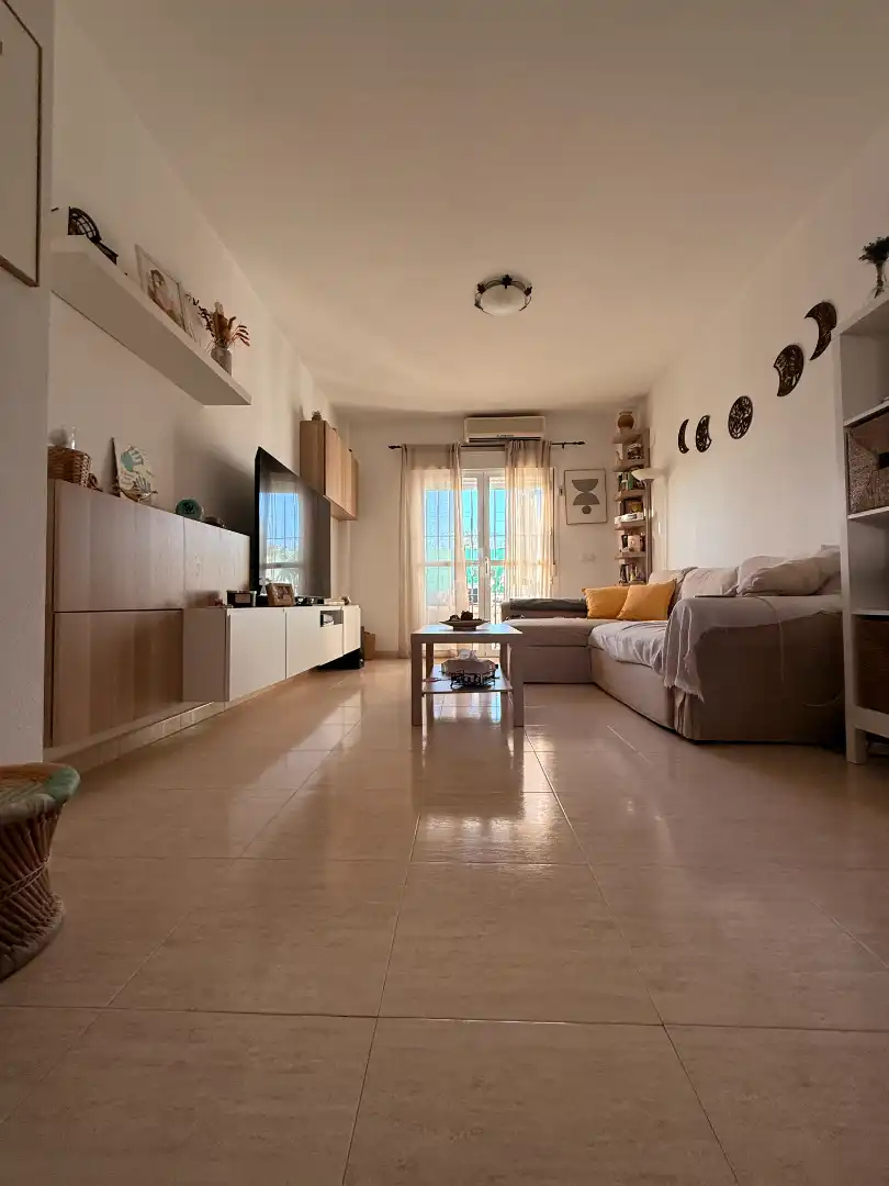 Sala de estar de Casa adosada en venta en Carrión de los Céspedes con Terraza