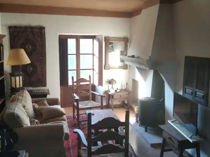 Sala d'estar de Casa adosada en venda en La Taha amb Aire condicionat, Traster i Balcó