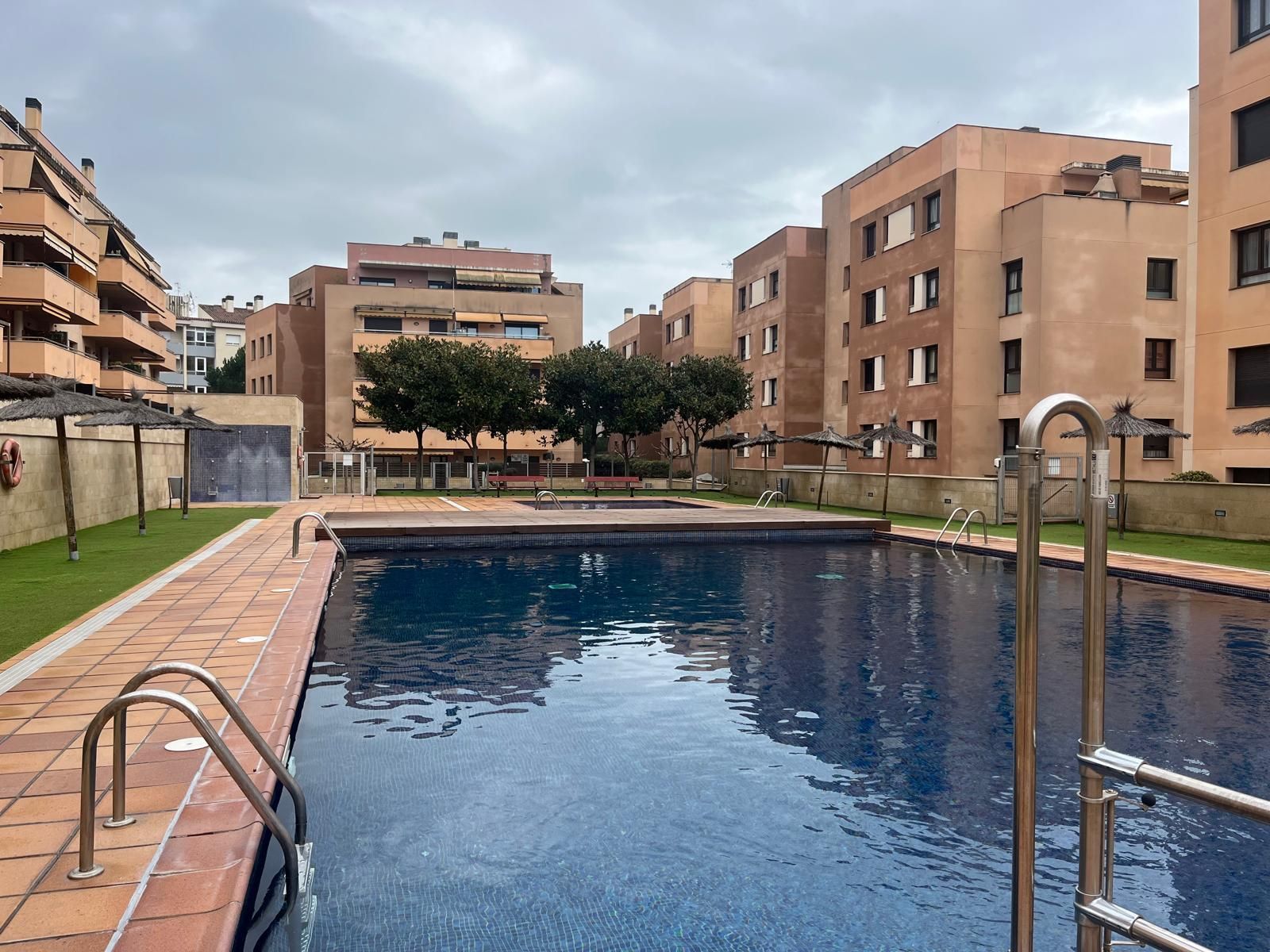 Swimming pool of Apartment for sale in Lloret de Mar  with Air Conditioner, Heating and Storage room