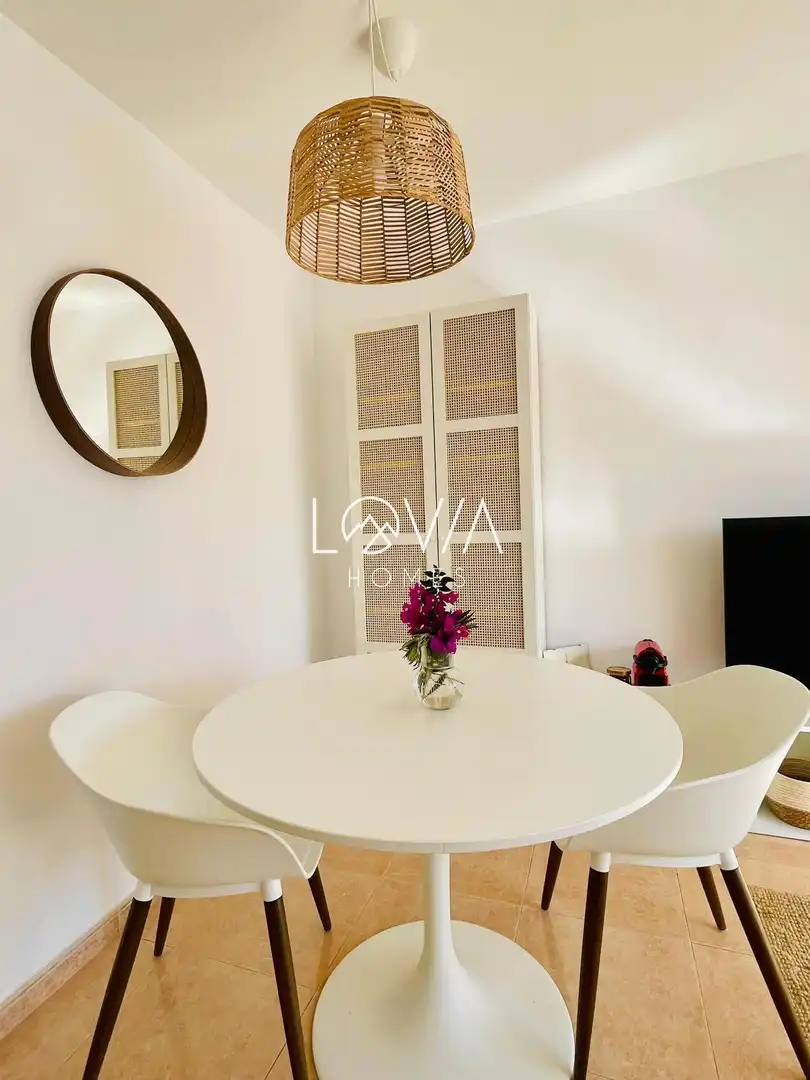 Sala d'estar de Apartament de lloguer en La Oliva amb Terrassa, Piscina i Piscina comunitària