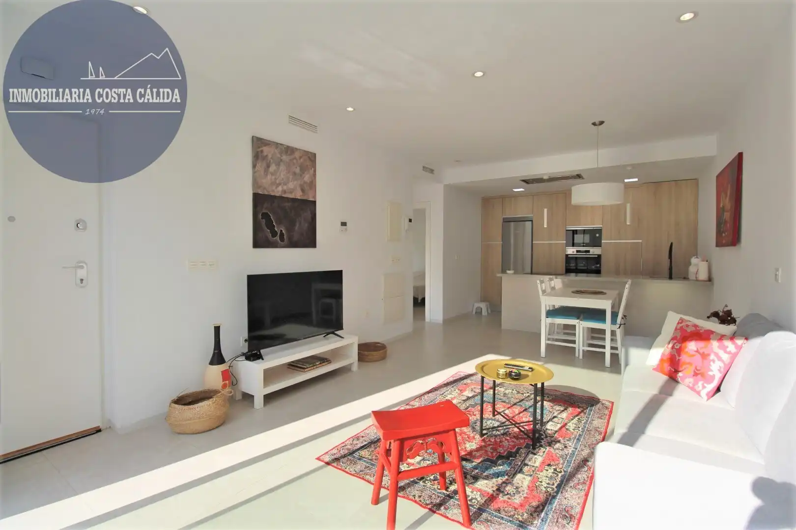 Sala de estar de Casa adosada en venta en Águilas con Aire acondicionado, Calefacción y Jardín privado