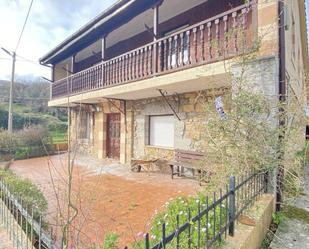 Exterior view of House or chalet for sale in Riotuerto  with Private garden