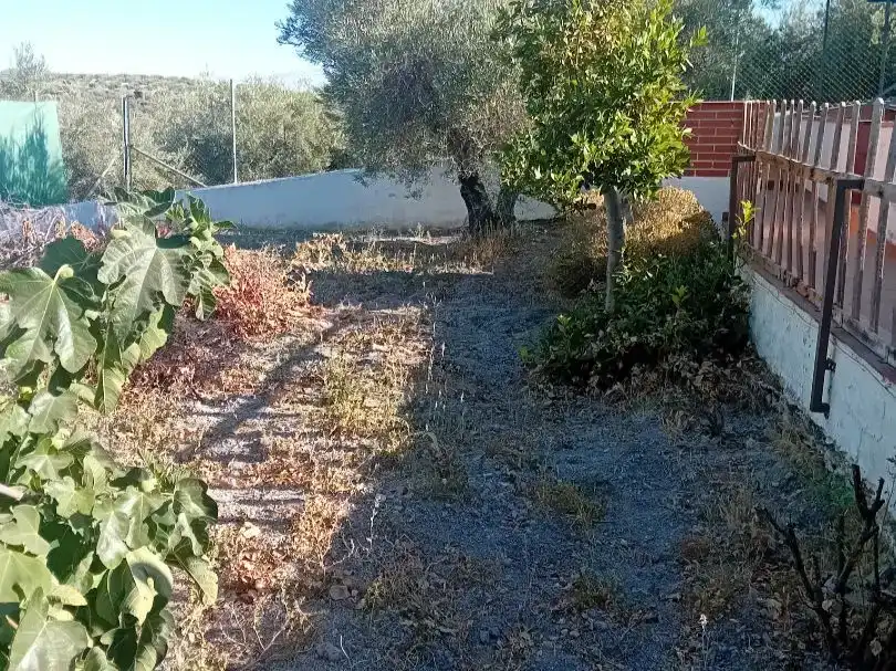 Casa adosada en venda en Martos amb Jardí privat, Traster i Piscina