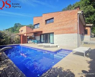 Swimming pool of House or chalet for sale in Girona Capital  with Air Conditioner, Heating and Private garden