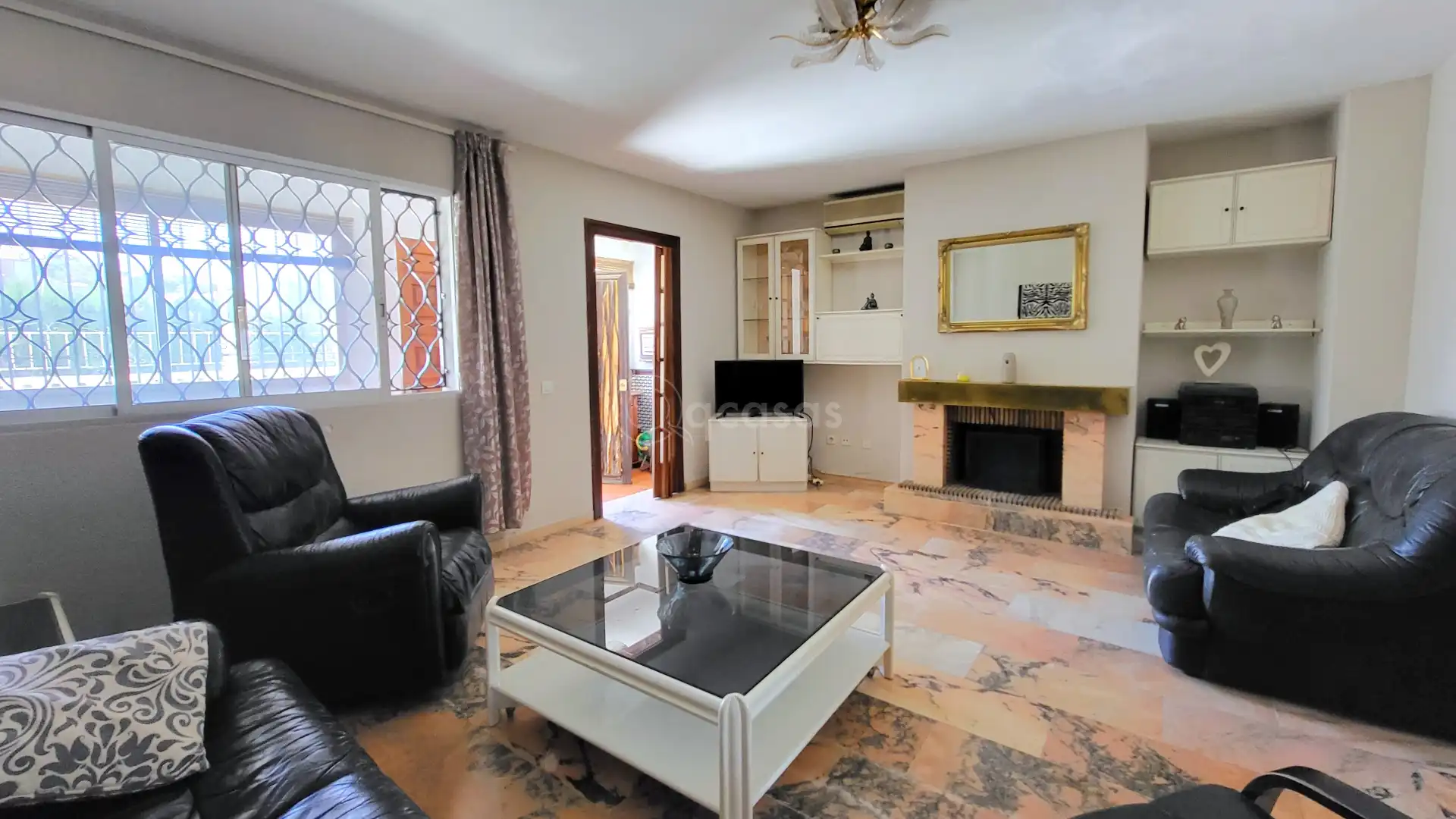 Sala d'estar de Casa adosada en venda en Benalmádena amb Aire condicionat, Calefacció i Terrassa