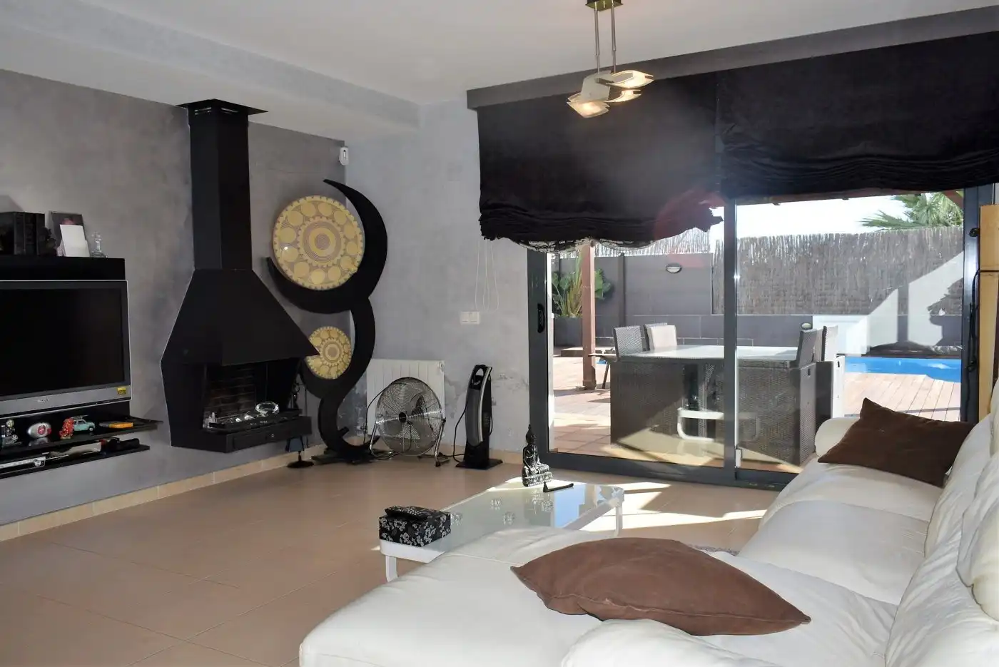 Sala d'estar de Casa adosada en venda en Calafell amb Calefacció, Jardí privat i Terrassa