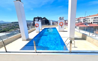 Swimming pool of Attic for sale in Vigo   with Heating, Private garden and Oven