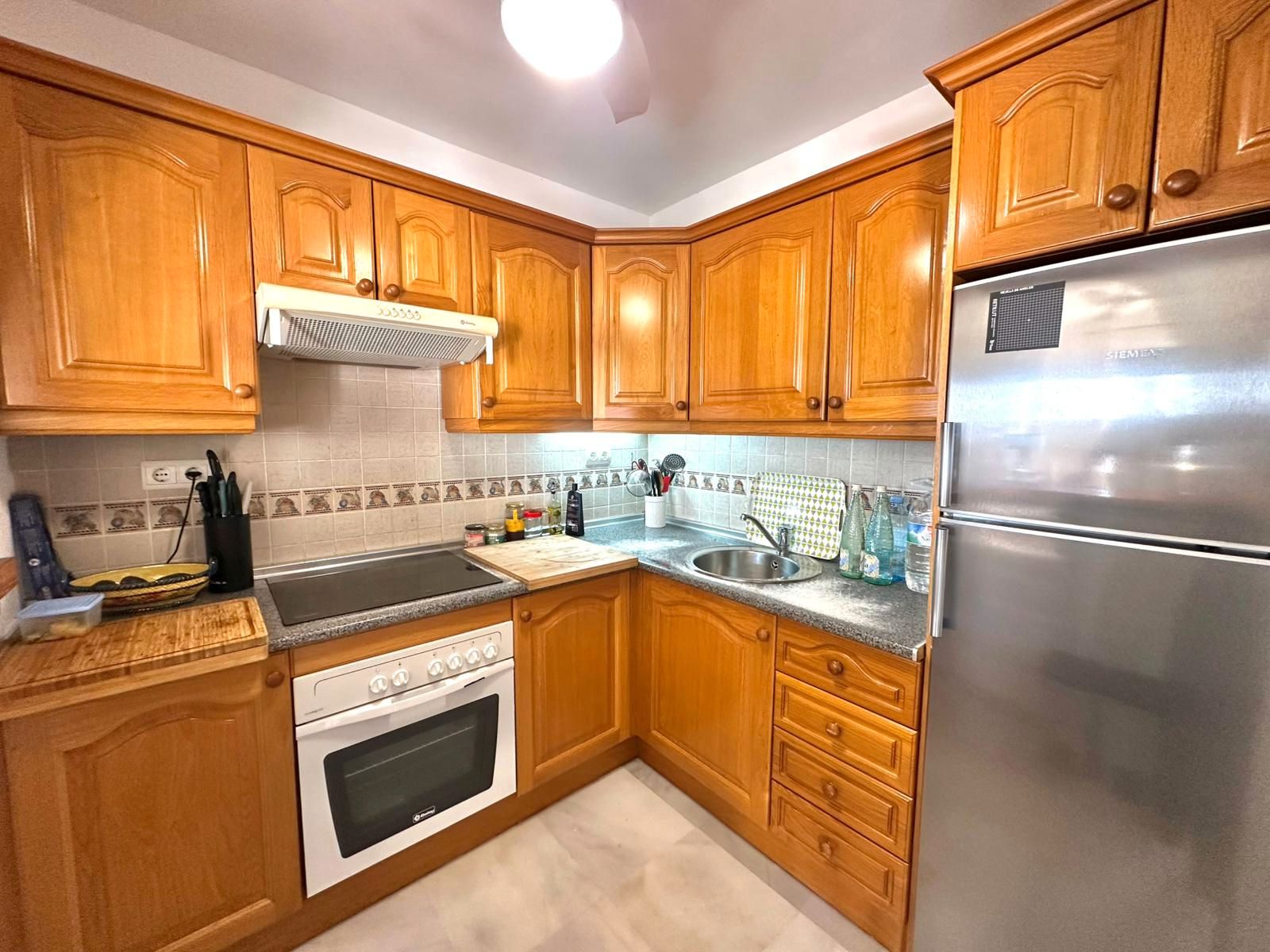 Kitchen of Flat for sale in Benalmádena  with Air Conditioner, Terrace and Community pool