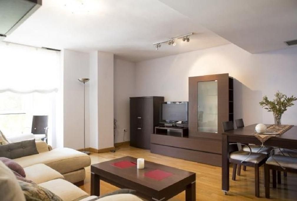 Living room of Flat to rent in El Puerto de Santa María  with Air Conditioner, Private garden and Parquet flooring