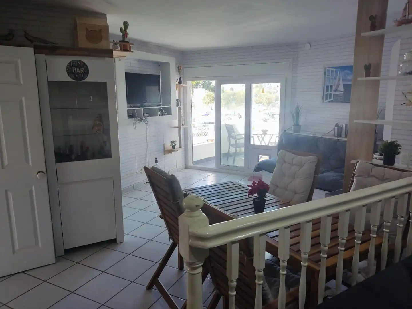 Sala de estar de Piso en venta en Roses con Jardín privado, Terraza y Amueblado