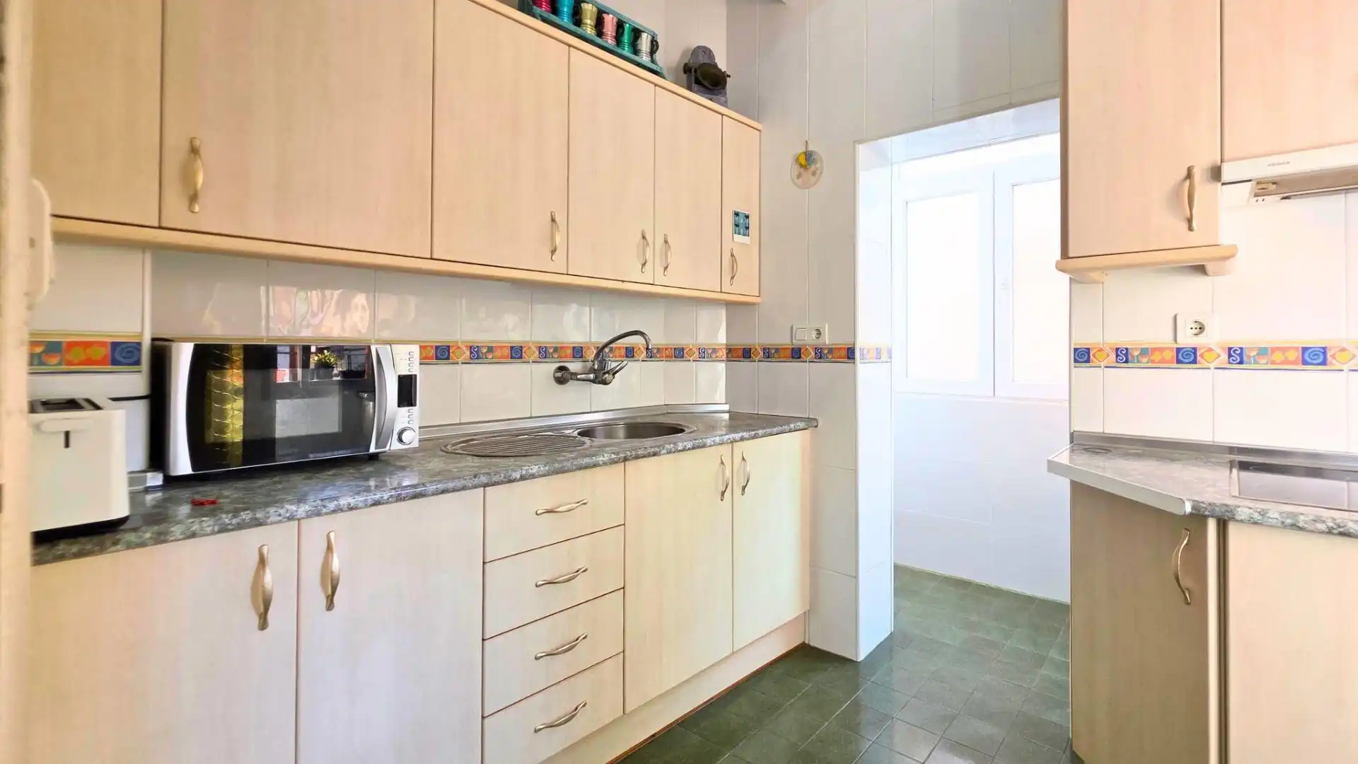 Kitchen of Flat for sale in Almería  with Air Conditioner, Private garden and Balcony