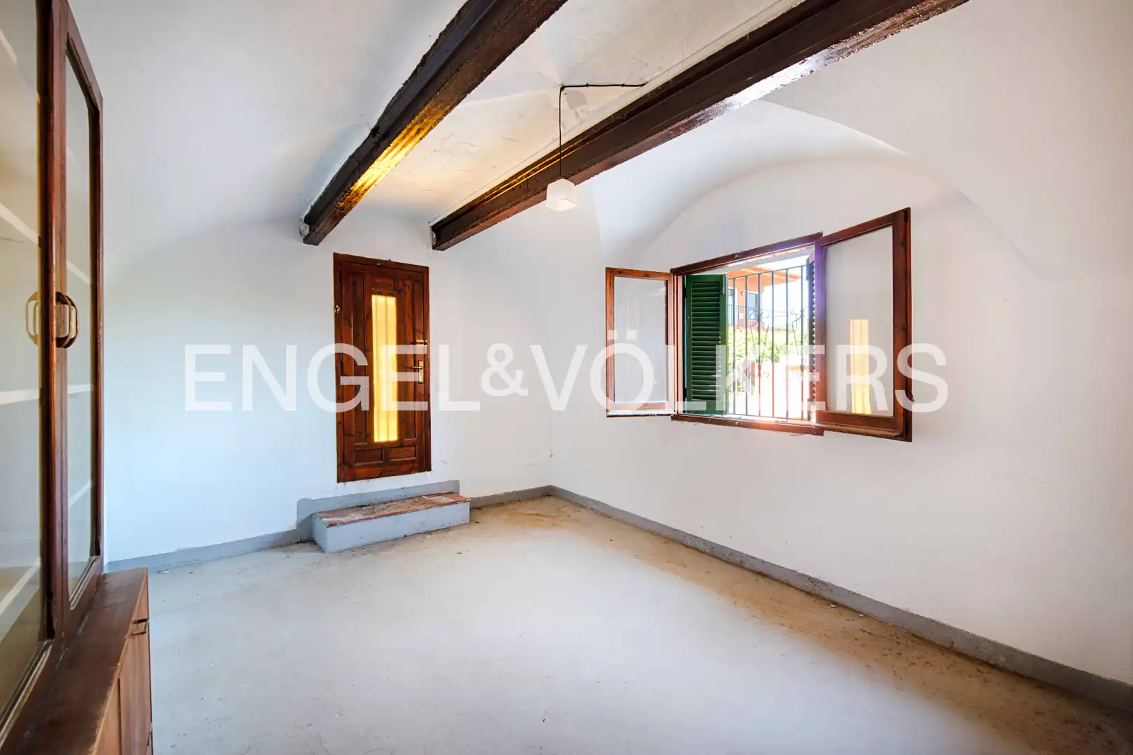 Sala de estar de Casa adosada en venta en Garriguella con Calefacción, Jardín privado y Terraza