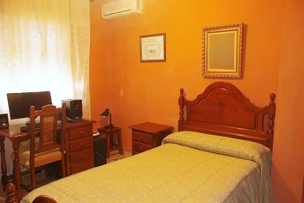 Dormitori de Casa adosada en venda en Coria amb Jardí privat i Balcó