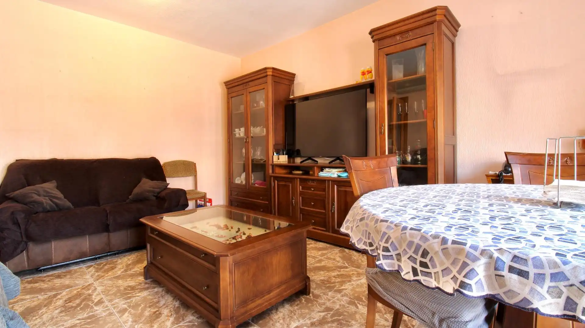 Sala de estar de Casa adosada en venta en Roquetas de Mar con Aire acondicionado, Terraza y Trastero