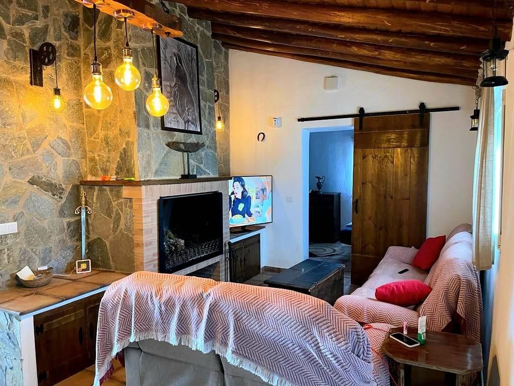 Sala d'estar de Finca rústica en venda en Villanueva de los Castillejos amb Aire condicionat, Calefacció i Terrassa