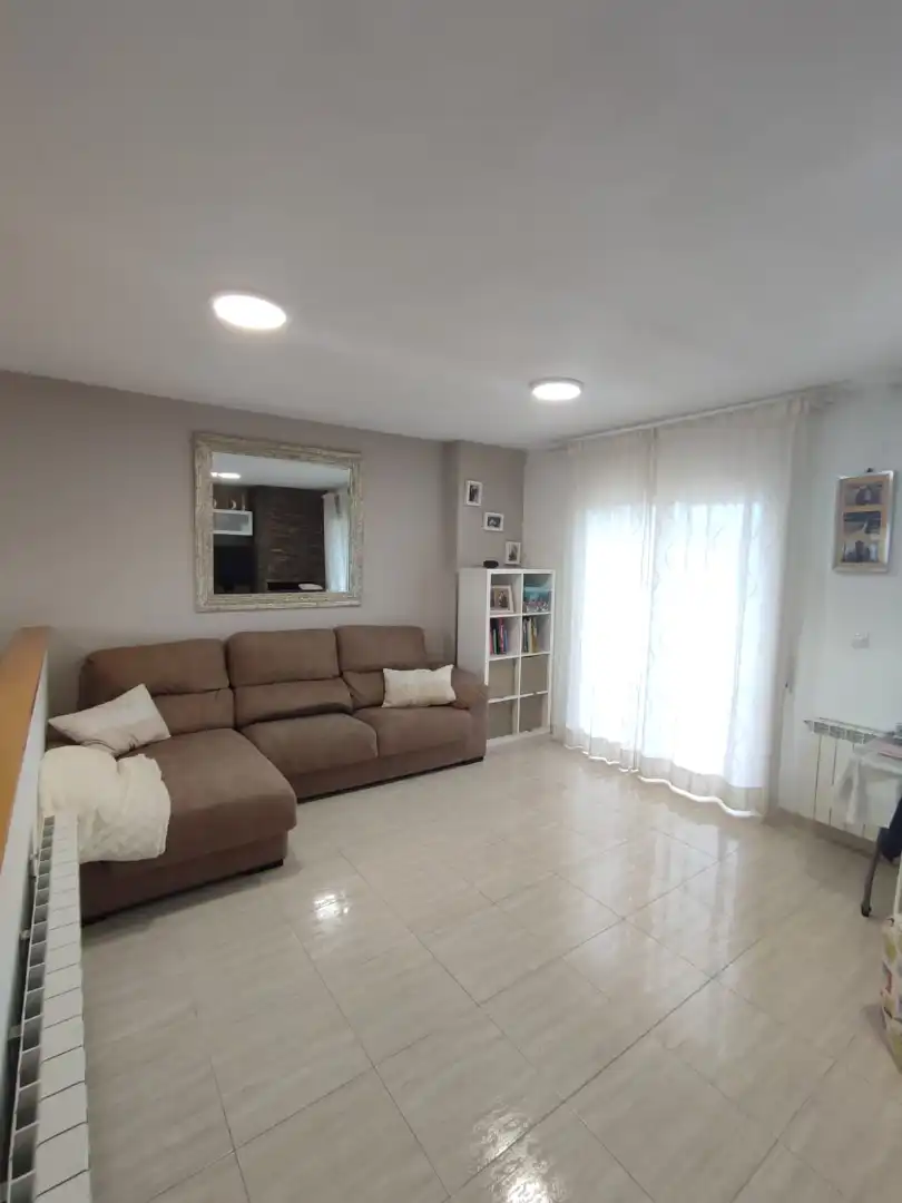 Sala de estar de Casa adosada en venta en Balaguer con Aire acondicionado, Calefacción y Jardín privado