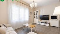 Sala d'estar de Casa adosada en venda en Las Gabias amb Aire condicionat, Terrassa i Balcó