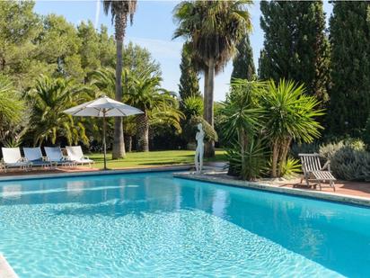 Piscina de Finca rústica en venda en Santa Eulària des Riu amb Aire condicionat, Jardí privat i Terrassa