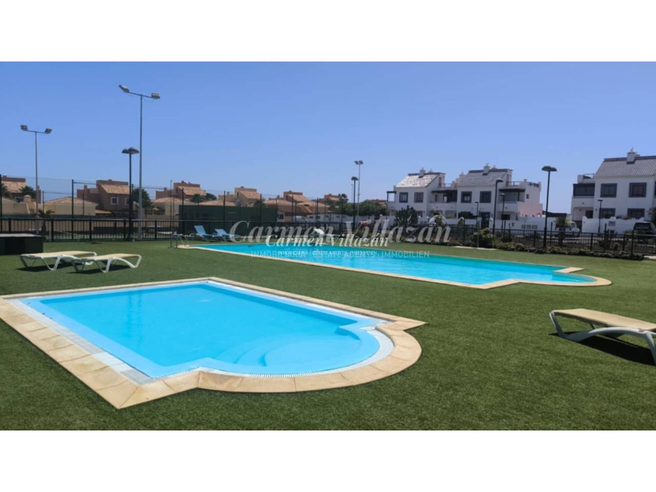 Swimming pool of Single-family semi-detached for sale in La Oliva  with Terrace, Furnished and Community pool