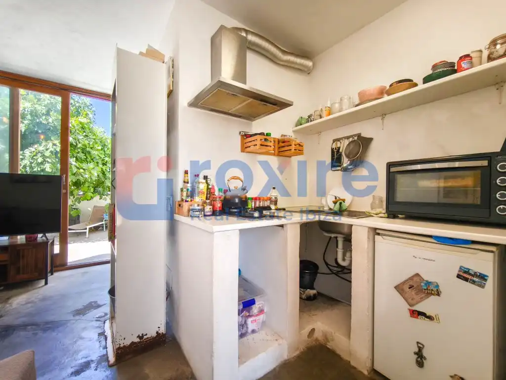 Cuina de Casa o xalet en venda en Sant Josep de sa Talaia amb Aire condicionat, Jardí privat i Terrassa