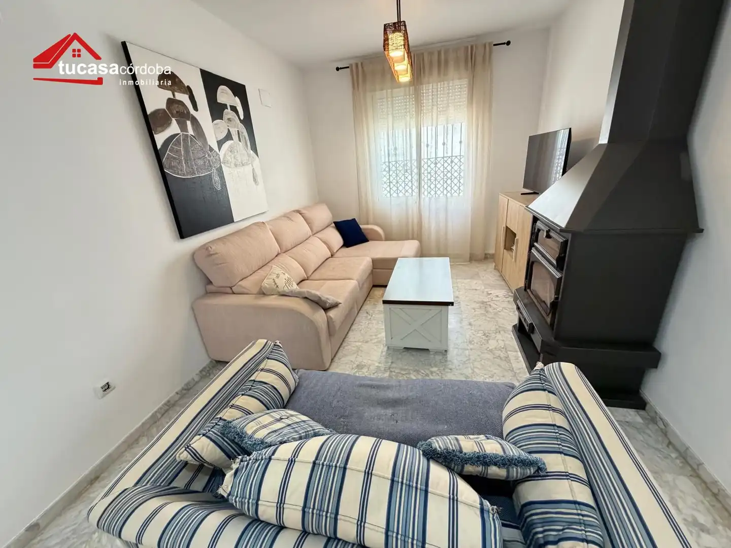 Sala d'estar de Casa adosada en venda en Córdoba amb Aire condicionat i Terrassa