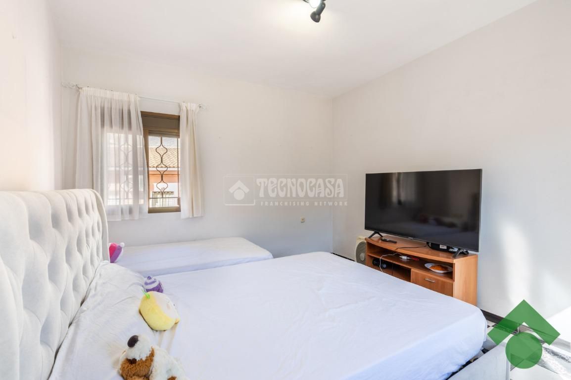 Dormitori de Casa adosada en venda en Loja amb Aire condicionat i Terrassa