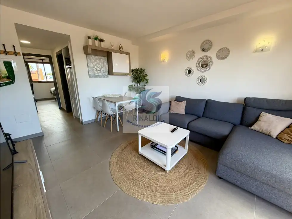 Sala de estar de Apartamento en venta en La Oliva con Terraza, Piscina y Amueblado
