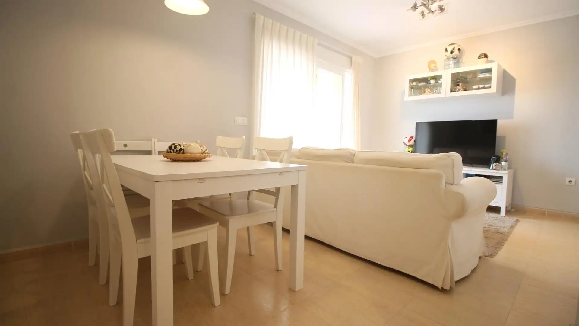 Sala de estar de Ático en venta en Dénia con Aire acondicionado, Terraza y Piscina comunitaria