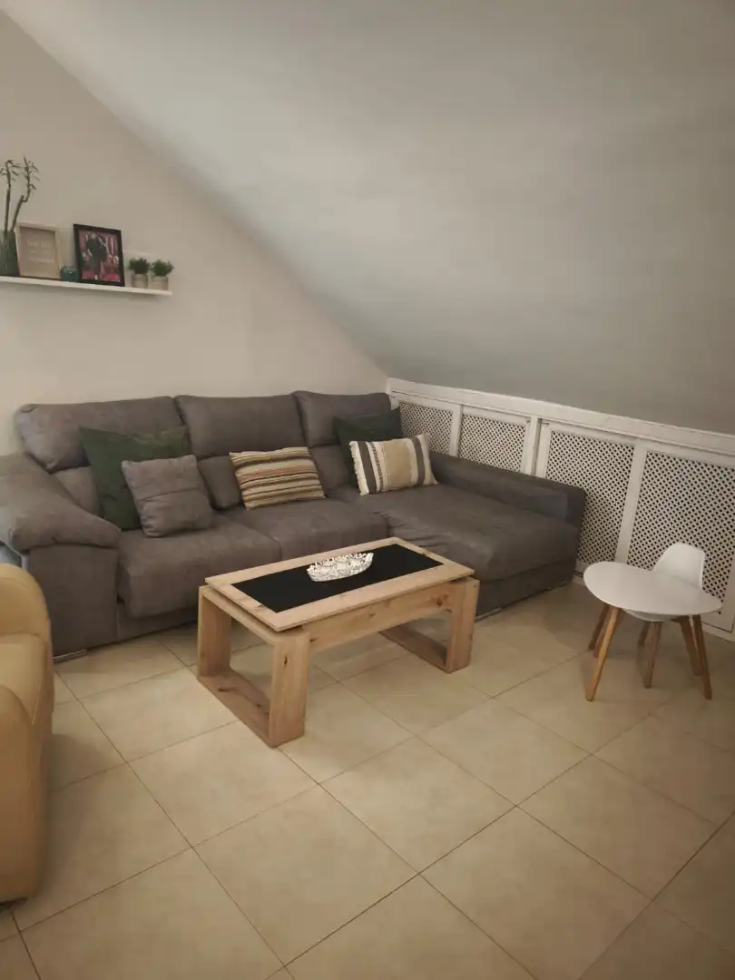 Sala de estar de Casa adosada en venta en Melilla con Aire acondicionado, Jardín privado y Terraza