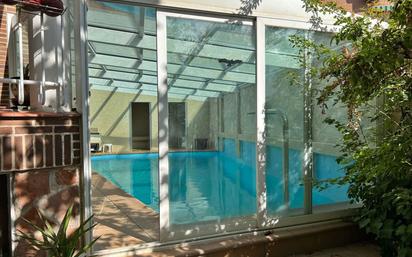 Swimming pool of Single-family semi-detached for sale in Arganda del Rey  with Air Conditioner and Storage room