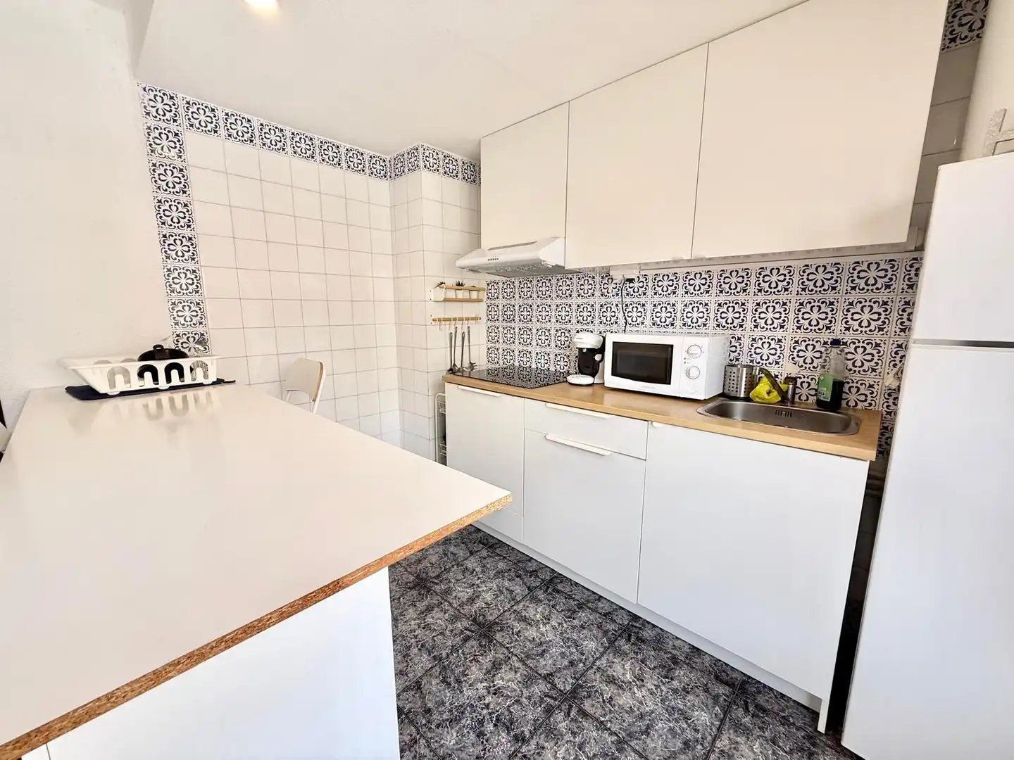 Cuina de Apartament de lloguer en La Manga del Mar Menor amb Aire condicionat, Calefacció i Piscina