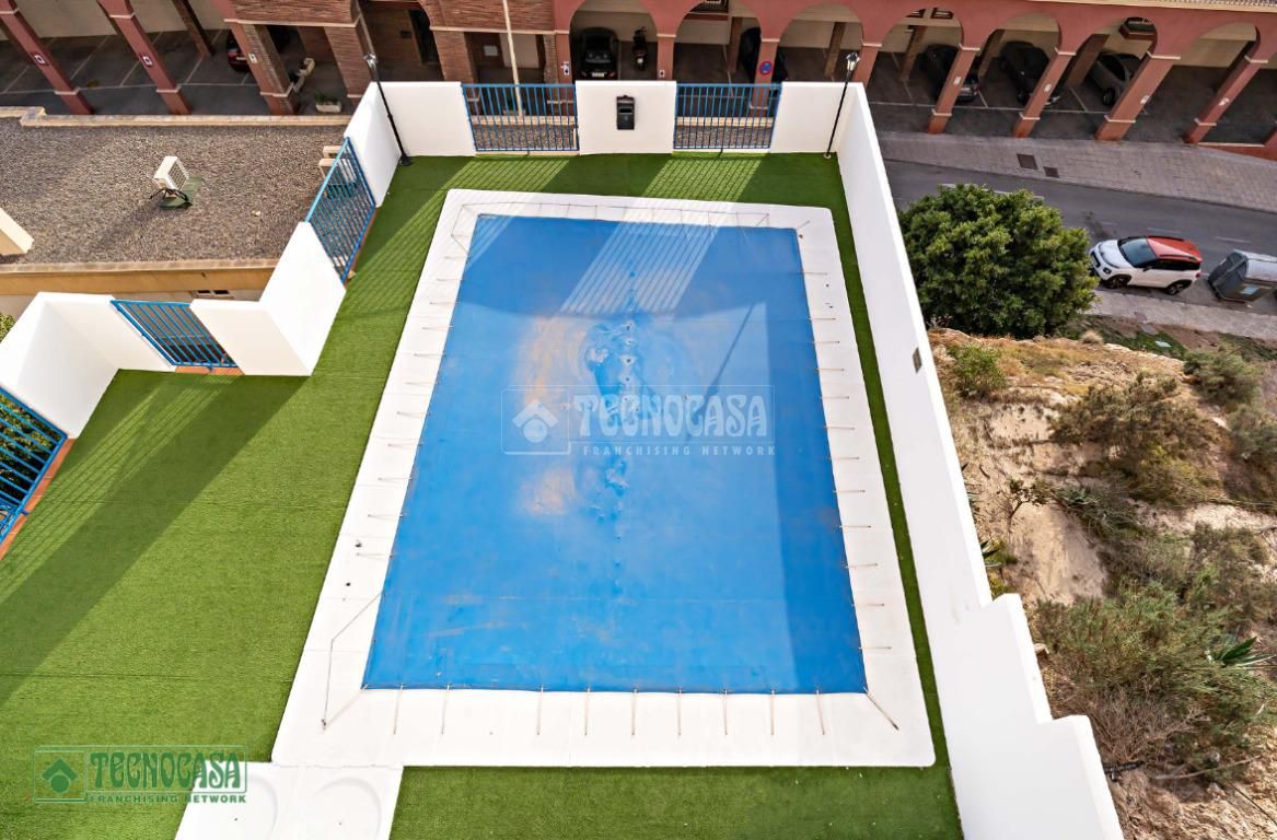 Swimming pool of Flat for sale in Roquetas de Mar  with Air Conditioner