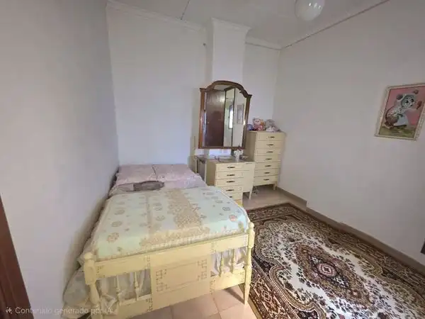 Dormitori de Casa adosada en venda en María amb Jardí privat, Traster i Moblat