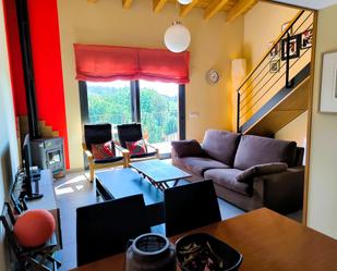 Living room of Duplex for sale in L'Esquirol  with Heating, Terrace and Furnished