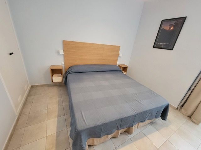 Dormitori de Apartament de lloguer en Málaga Capital amb Aire condicionat i Moblat