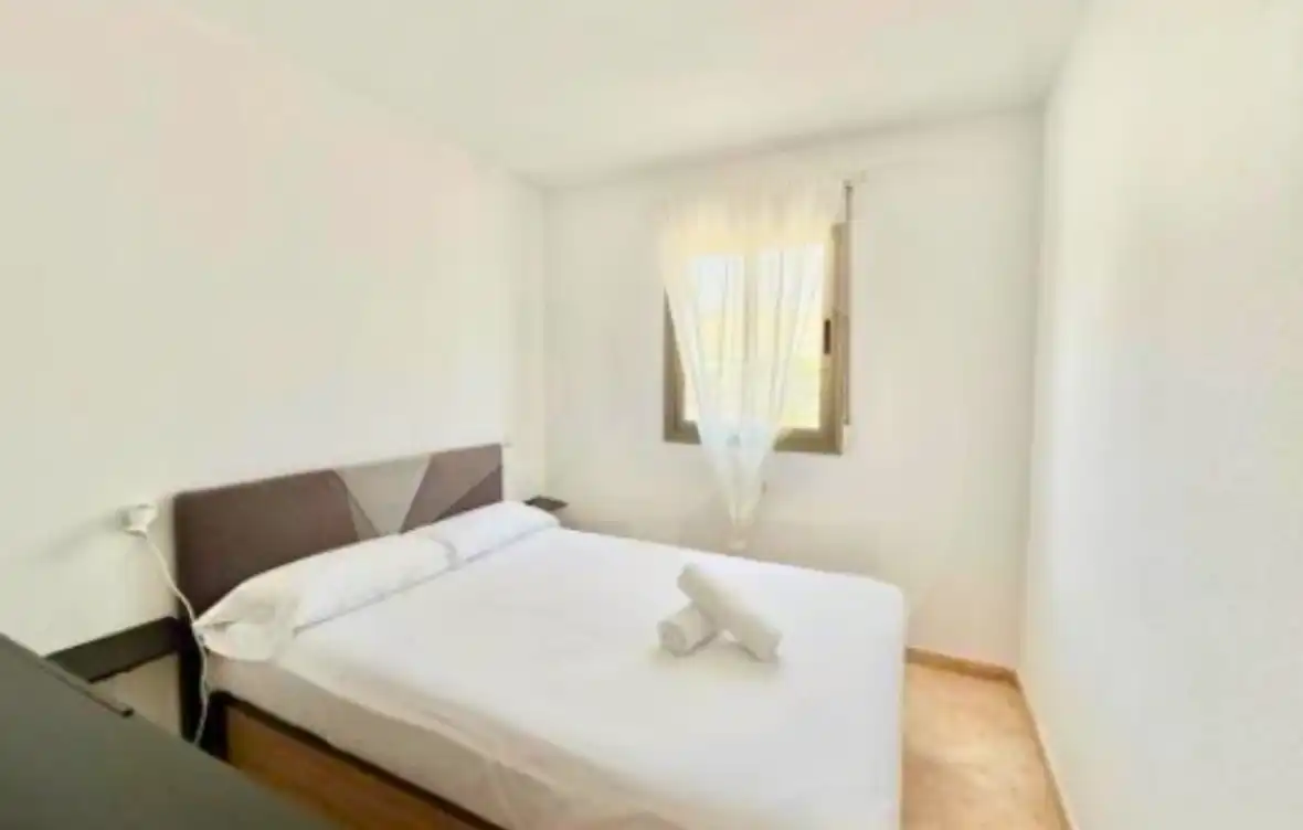 Habitación de Apartamento de alquiler en Villajoyosa / La Vila Joiosa con Aire acondicionado, Terraza y Piscina