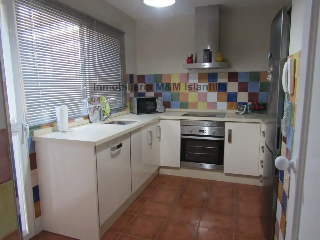 Cocina de Casa adosada en venta en Islantilla con Jardín privado, Terraza y Amueblado