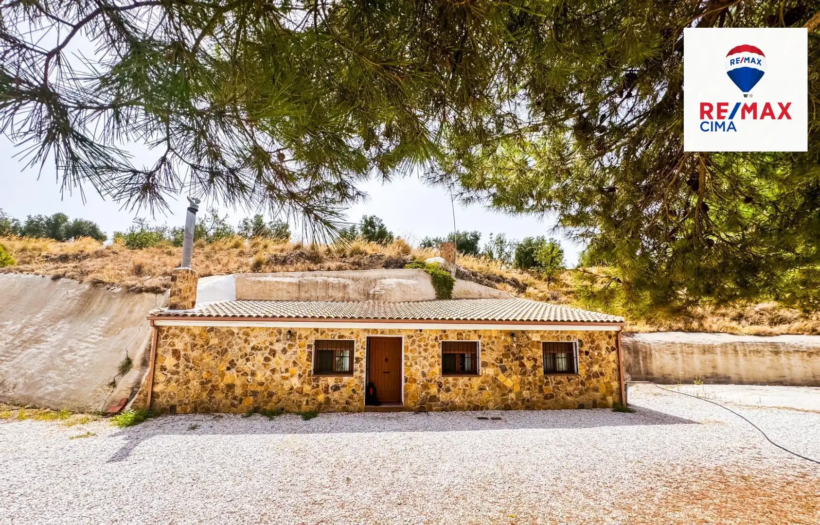 Vista exterior de Casa o xalet en venda en Cuevas del Campo amb Terrassa i Moblat