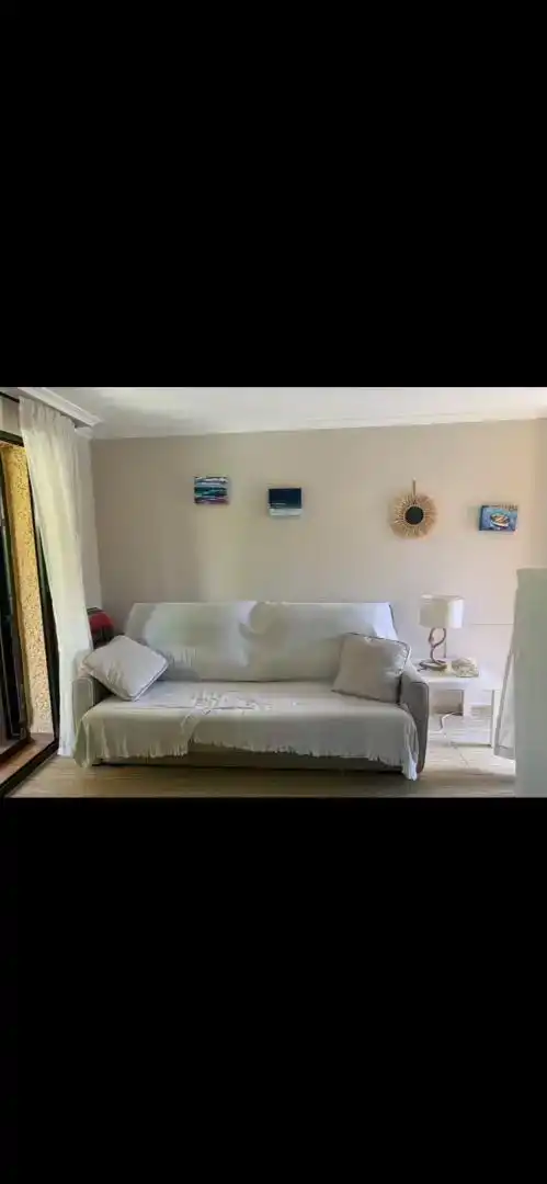 Sala d'estar de Apartament de lloguer en La Manga del Mar Menor amb Aire condicionat i Moblat