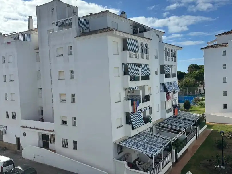 Vista exterior de Apartamento de alquiler en El Portil con Jardín privado, Terraza y Piscina