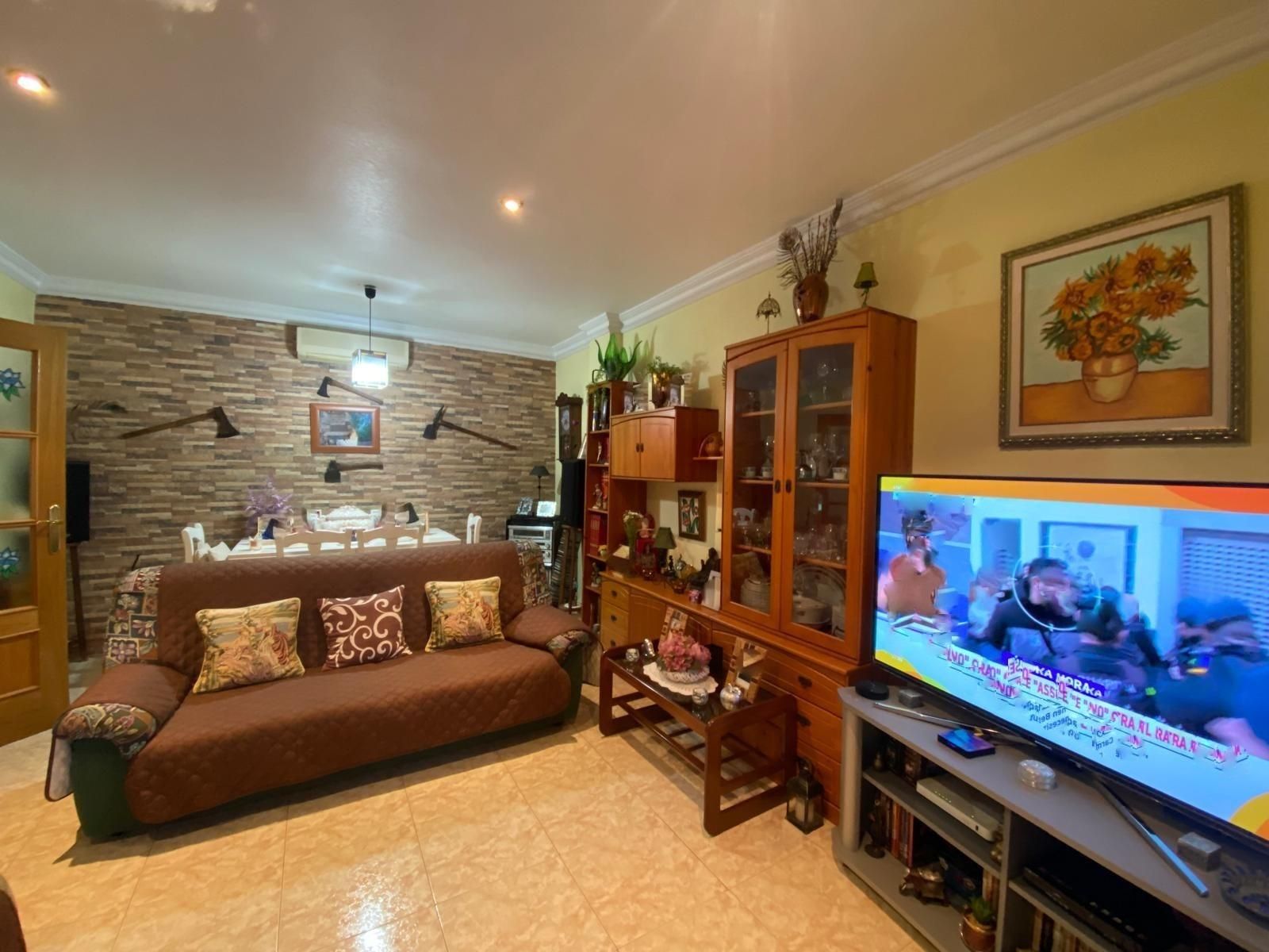 Sala d'estar de Casa adosada en venda en Lorca amb Aire condicionat, Jardí privat i Terrassa