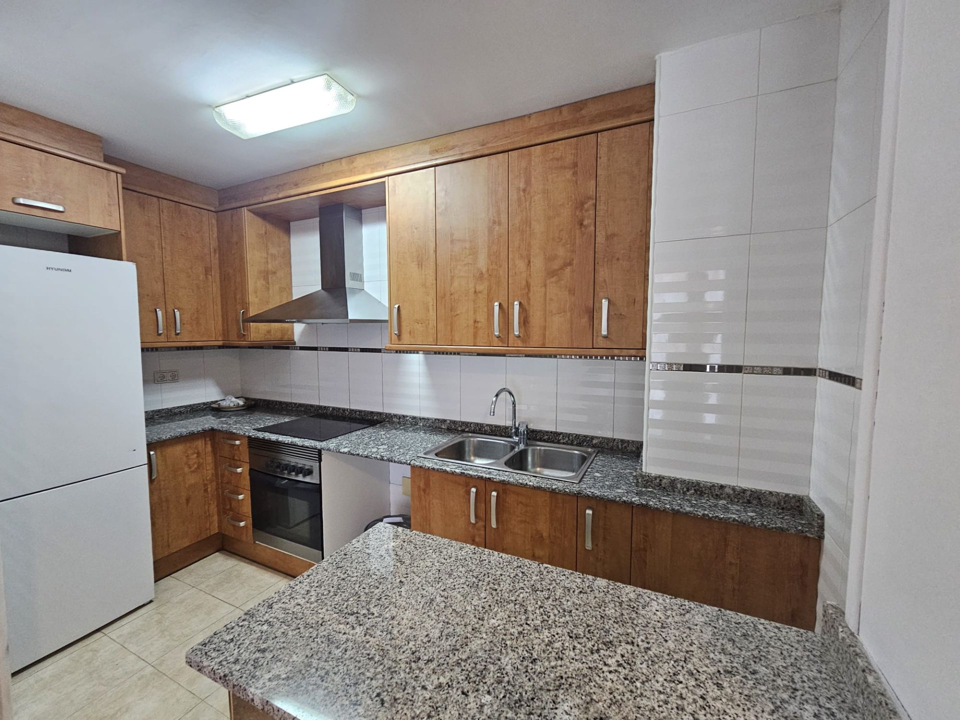 Cuina de Apartament de lloguer en  Lleida Capital amb Calefacció, Parquet i Moblat