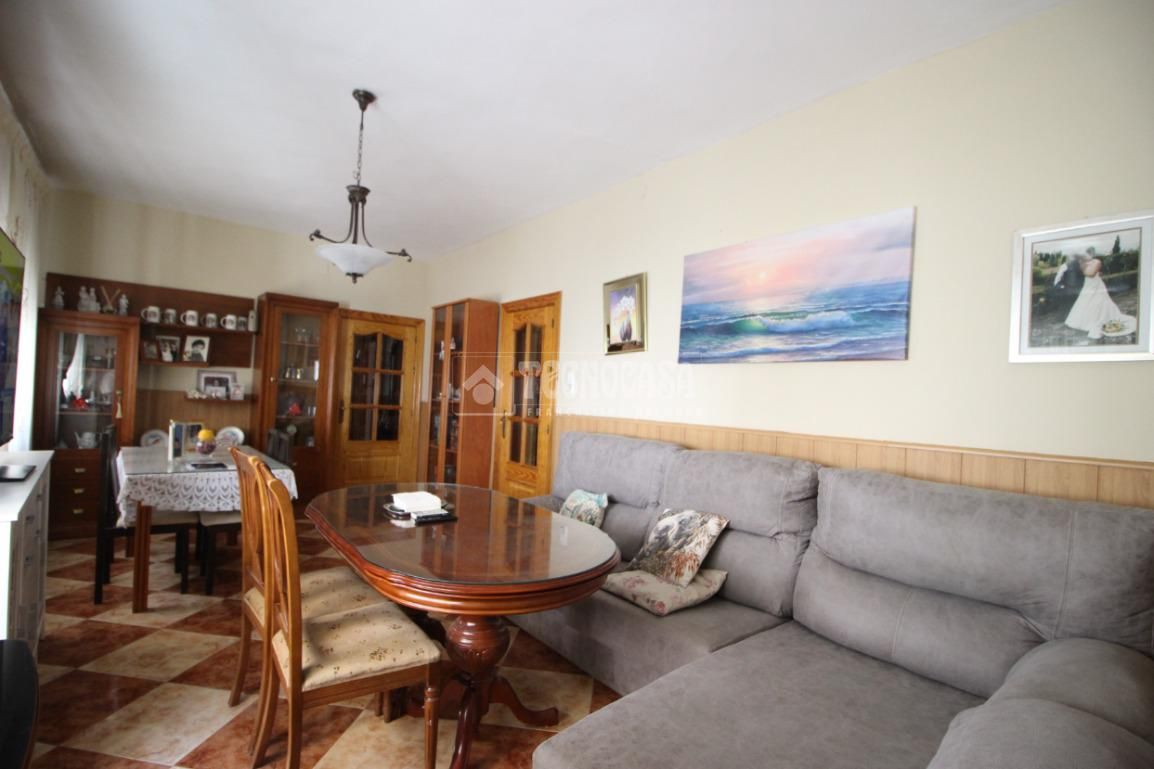 Sala d'estar de Casa adosada en venda en Churriana de la Vega