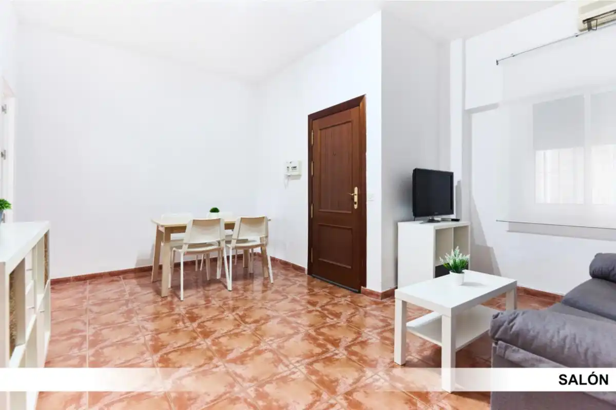 Sala d'estar de Apartament per a compartir en Alcalá de Guadaira amb Aire condicionat, Calefacció i Moblat
