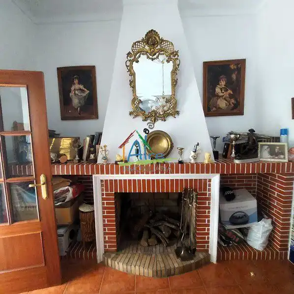 Sala de estar de Casa adosada en venta en Cala con Terraza, Trastero y Amueblado