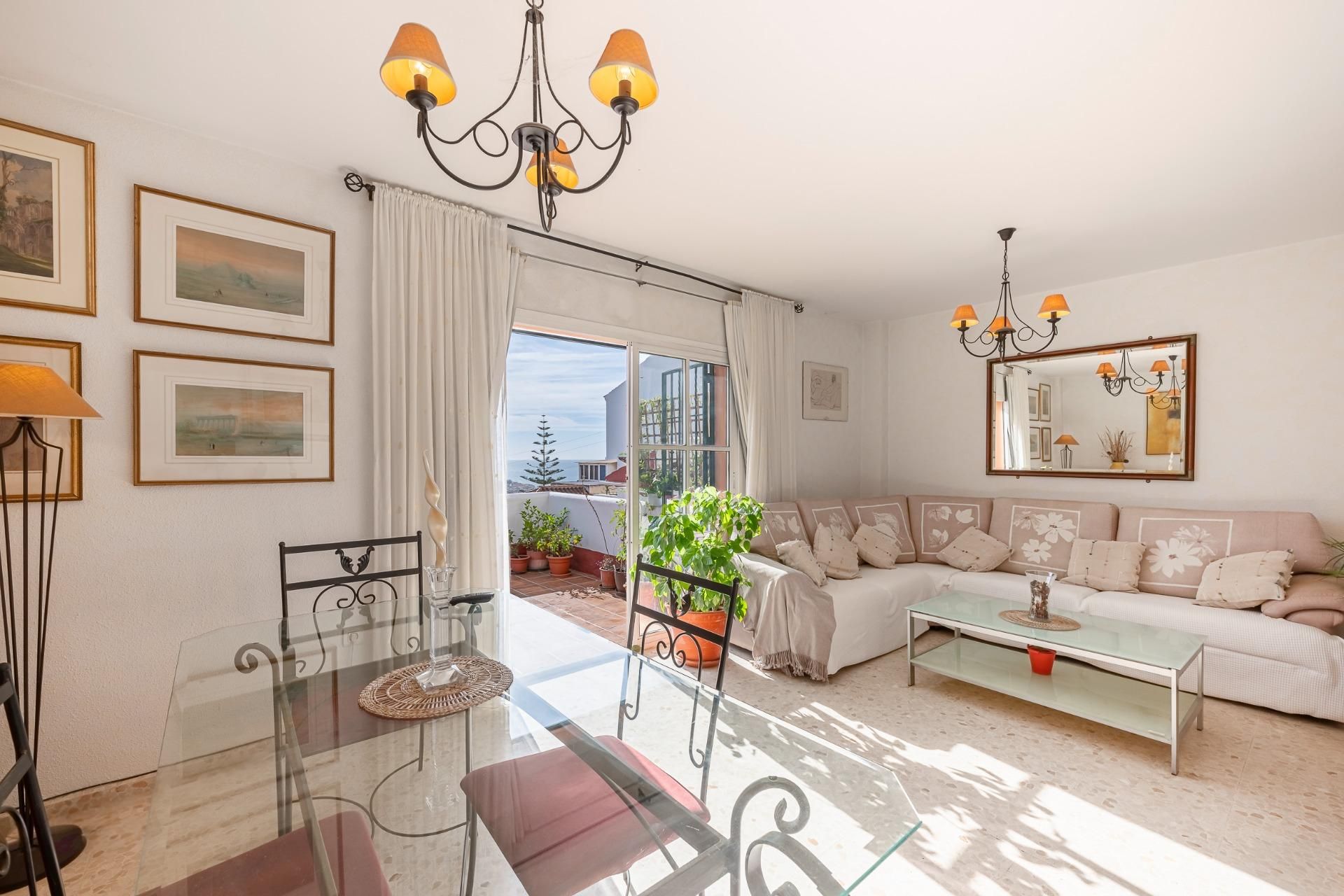 Sala de estar de Casa adosada en venta en Rincón de la Victoria