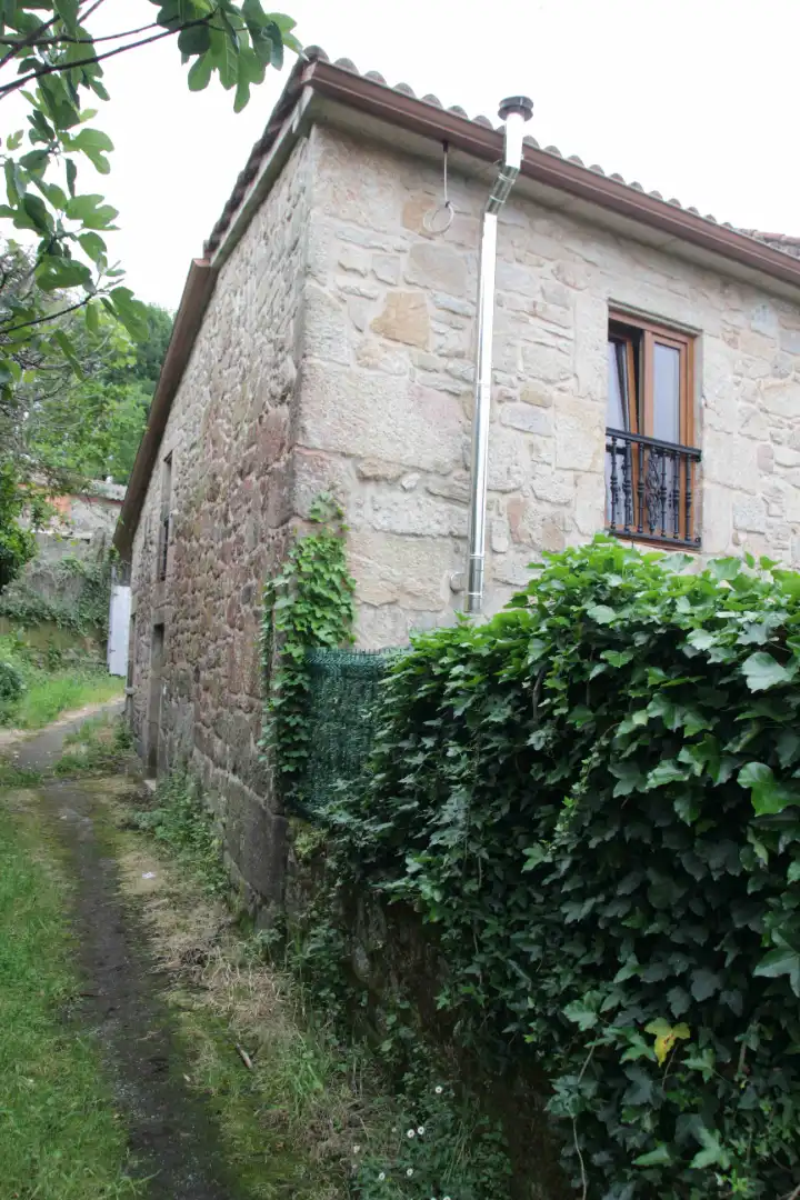Vista exterior de Casa adosada en venda en Padrón amb Jardí privat, Moblat i Forn