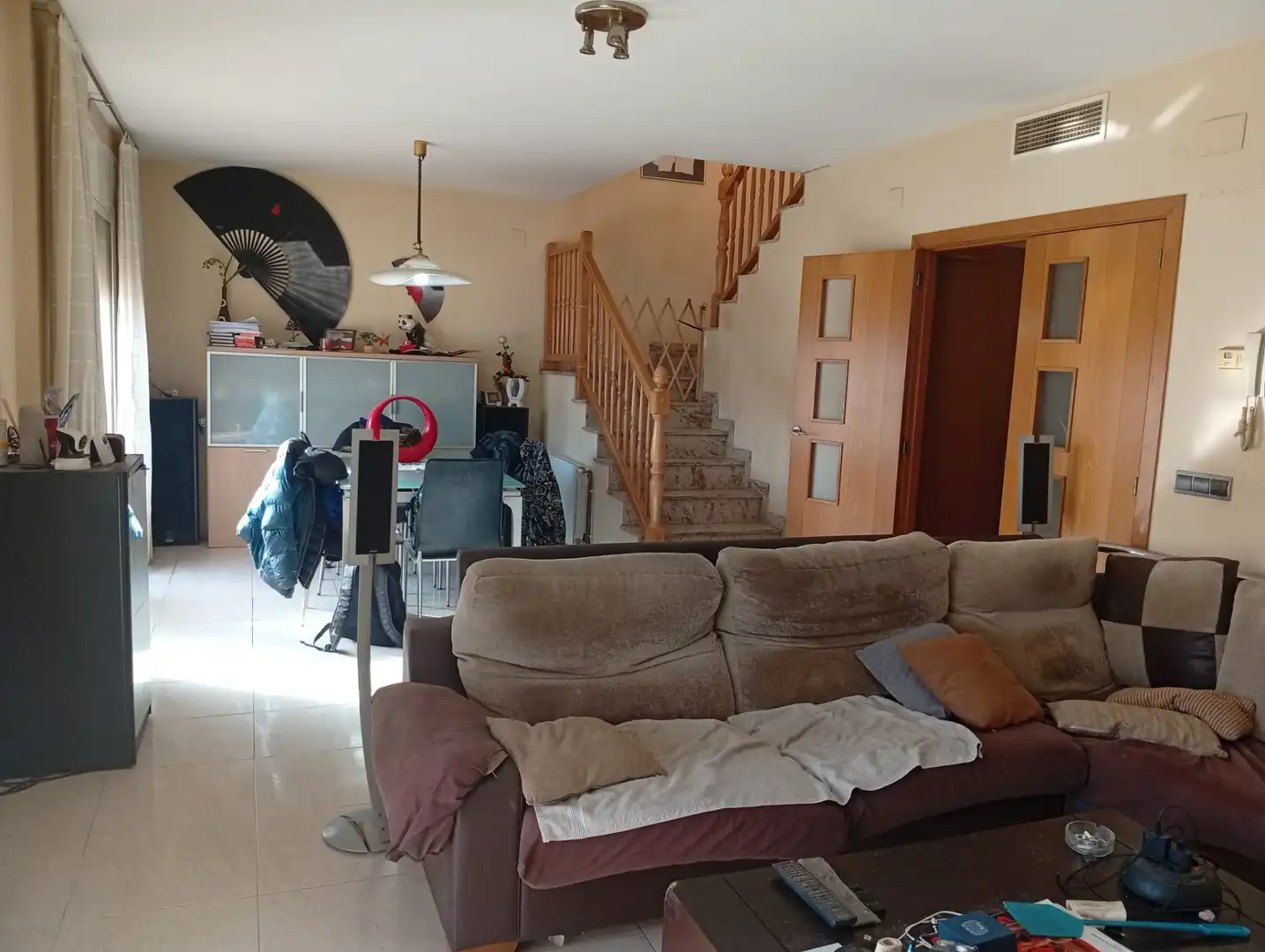 Sala d'estar de Casa adosada en venda en L'Aldea amb Aire condicionat, Calefacció i Jardí privat