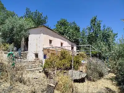 Vista exterior de Finca rústica en venda en Alpujarra de la Sierra amb Calefacció, Jardí privat i Moblat
